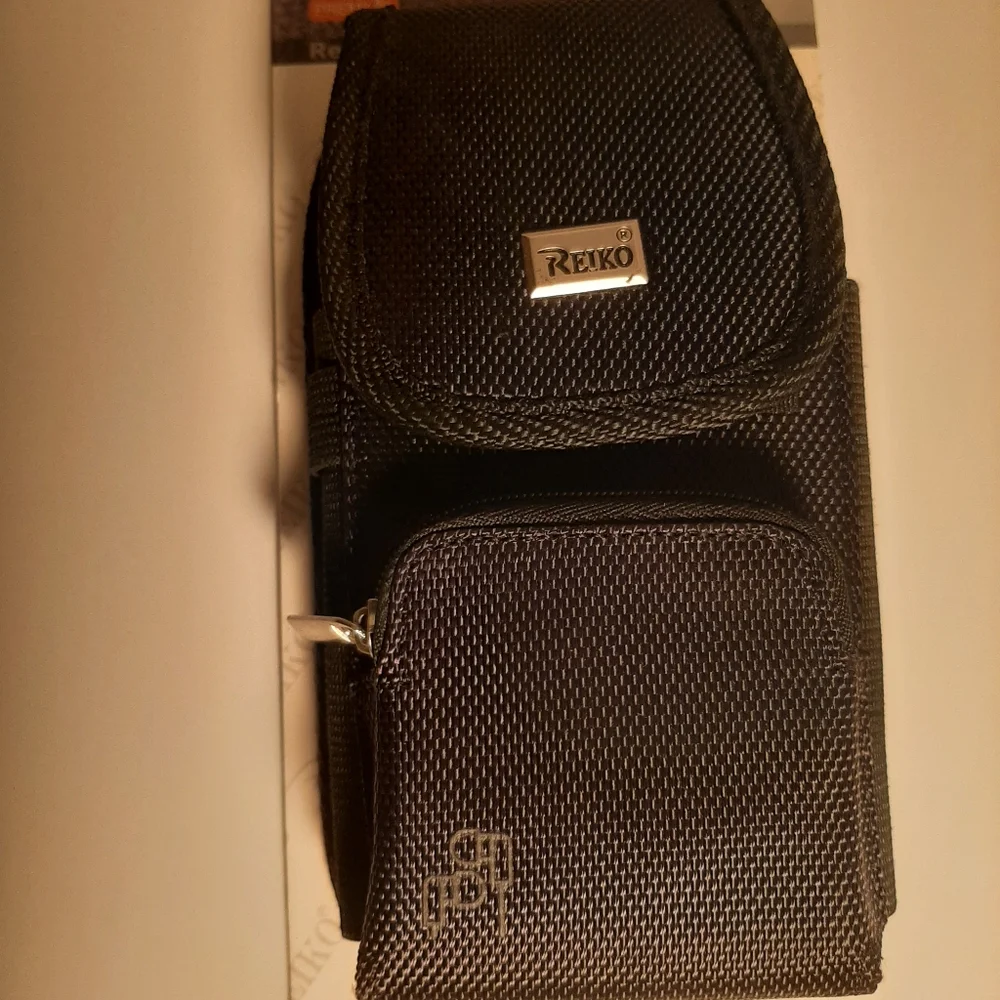 Cell phone belt clip/carrier